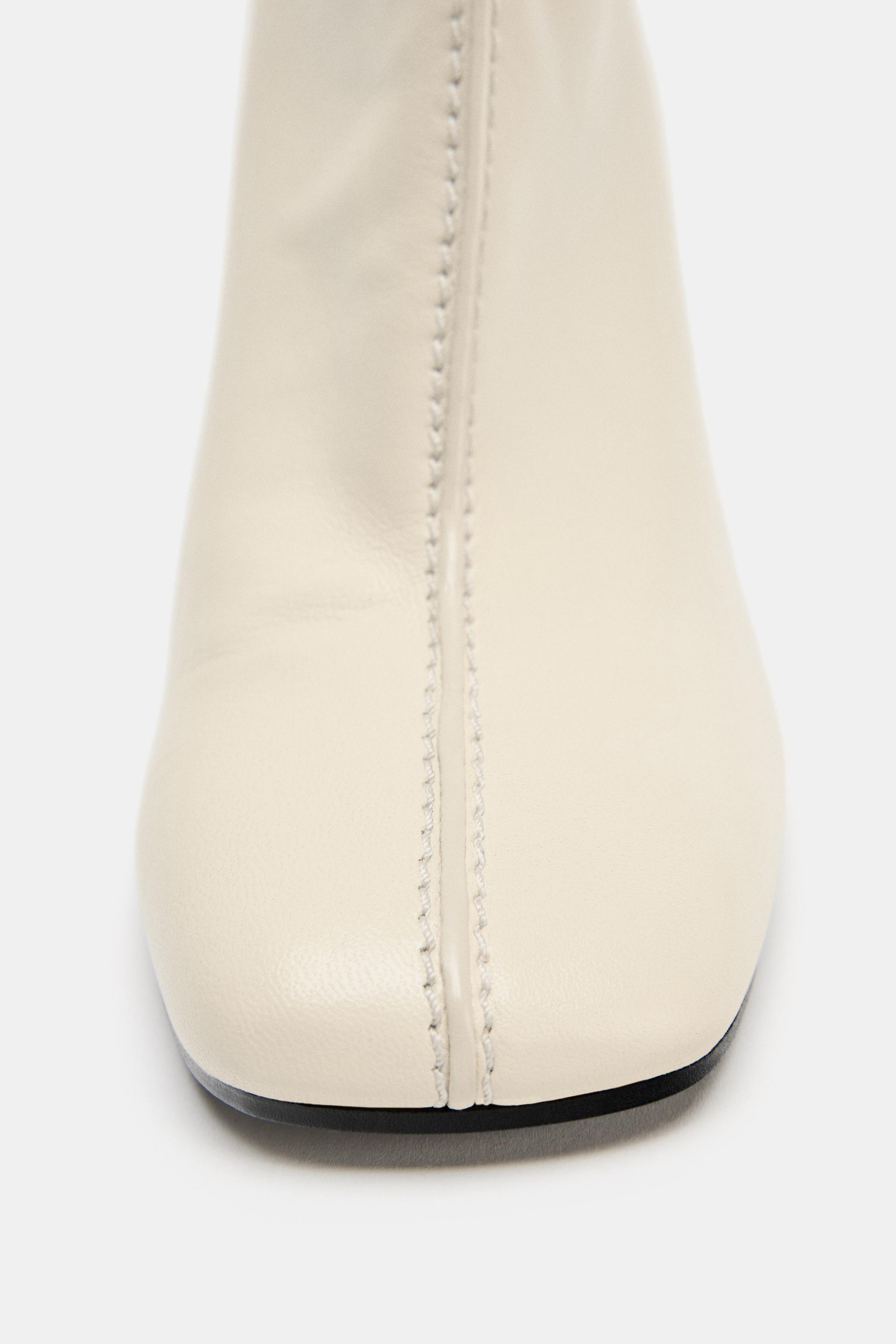 BOTTINES À TALONS EN CUIR LIMITED EDITION